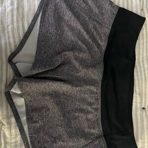 Lululemon 4 inch running shorts. Color is heathered black.